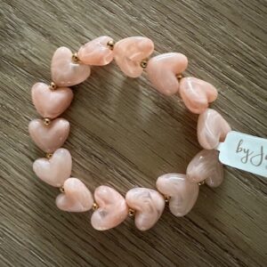 Licht roze armband met hartjes By Jam